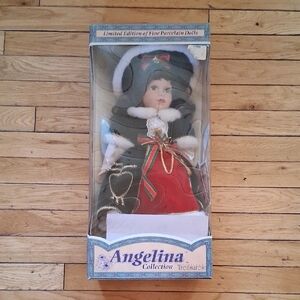 Porcelain Doll with Red and Black Outfit